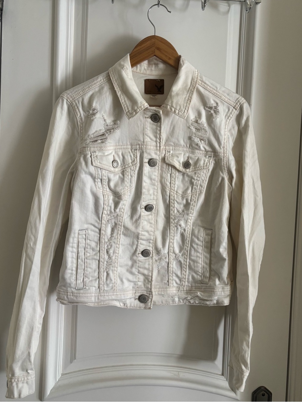 American Eagle Outfitters Cream Distressed Denim Jacket